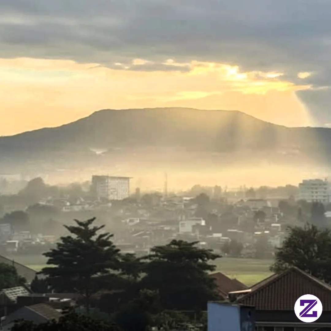 “Golden Rays Over Mount Tangkuban Perahu: A Sunrise Above The Mist” 🌄