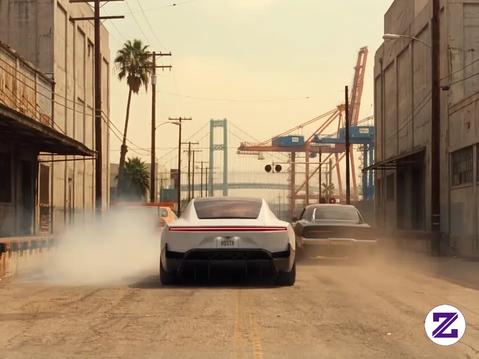 Tesla Roadster Race Against Legendary Racer..